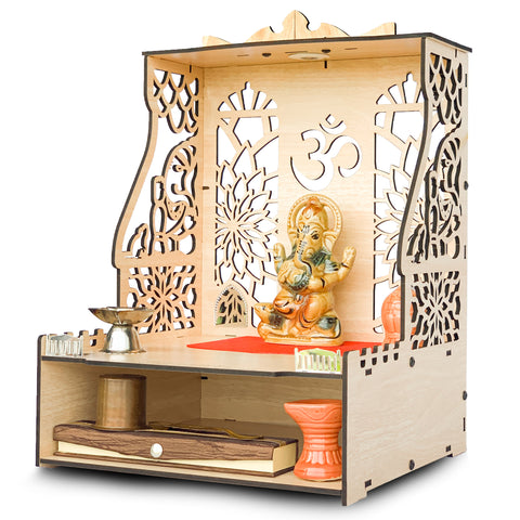 Townside Lambodar Gajanan Temple, Beige Coloured, With Yellow LED Spot Light. Lord Ganesha is there on the side walls and back wall has laser cut decoration. Overall it gives a very open feeling. It is side pose photo