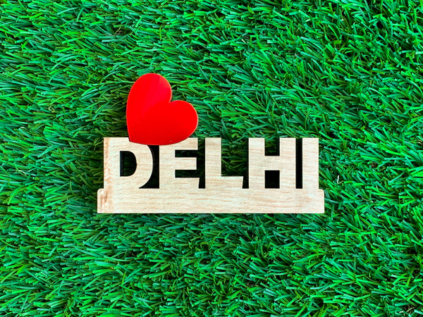 Love Delhi signage on green grass