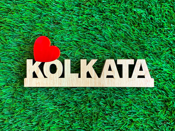 love kolkata signage on green grass