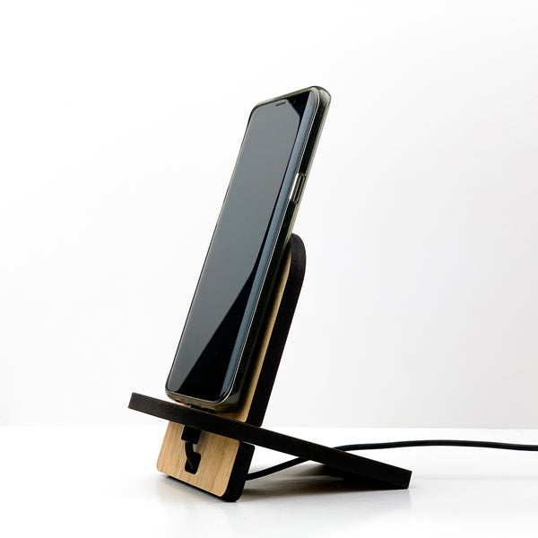 galliard games wooden phone stand with phone and charging cable